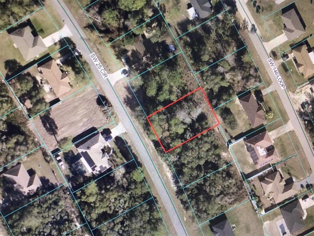 0 Southwest 25th Circle Ocala, FL 34472 - Photo 2 of 6 an aerial view of a house with a yard