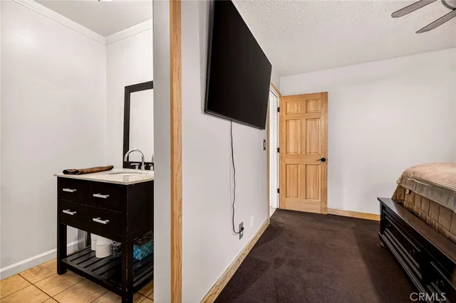 a bathroom with a sink a toilet and a bathtub