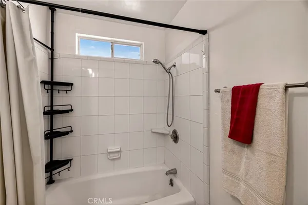 a bathroom with a sink and a bathtub