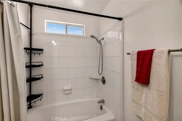 a bathroom with a sink and a bathtub