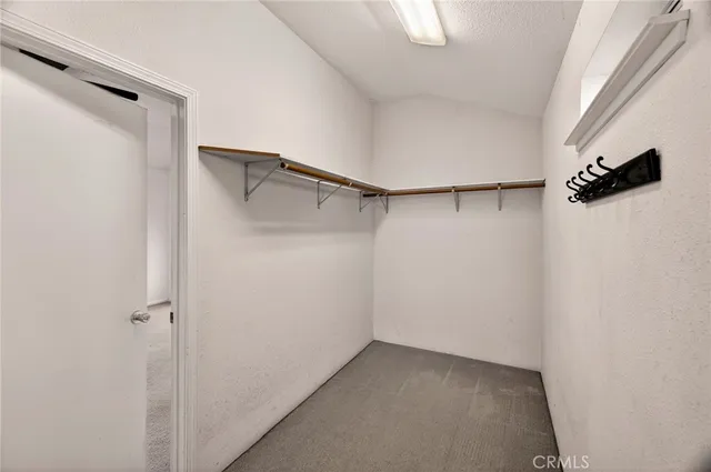 a view of a backyard with swimming pool