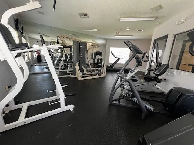 a balcony with view of swimming pool