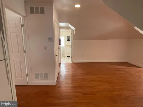 a kitchen with a stove and a sink