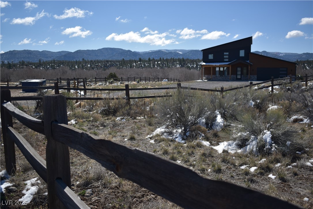 187 West Bryce Gate Circle Hatch, UT 84735 - Photo 11 of 25 View of yard featuring fence, a mountain view, and