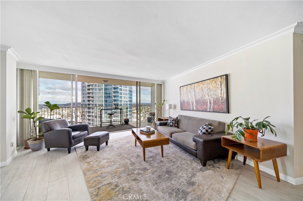 700 East Ocean Boulevard, Unit 3003 Long Beach, CA 90802 - Photo 5 of 35 a living room with furniture and a large window
