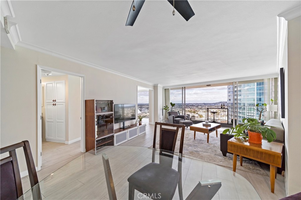 700 East Ocean Boulevard, Unit 3003 Long Beach, CA 90802 - Photo 10 of 35 a living room with furniture and a floor to ceiling window