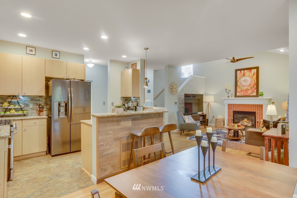 102 South 49th Street, Unit A Renton, WA 98055 - Photo 13 of 35 a view of a kitchen and dining room