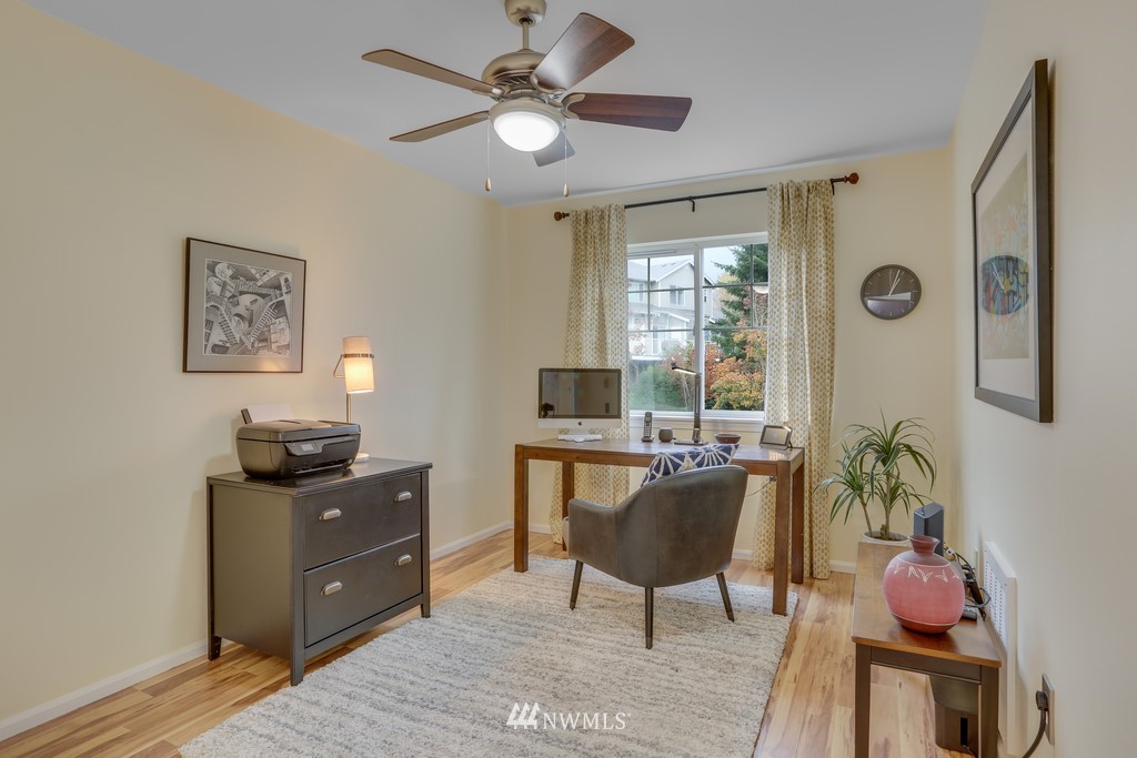 102 South 49th Street, Unit A Renton, WA 98055 - Photo 23 of 35 a workspace with furniture and window