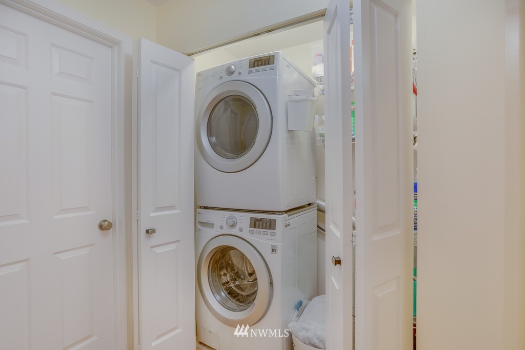 102 South 49th Street, Unit A Renton, WA 98055 - Photo 25 of 35 a utility room with dryer and washer