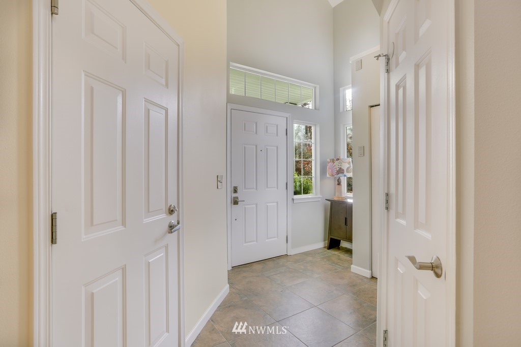 102 South 49th Street, Unit A Renton, WA 98055 - Photo 5 of 35 a view of a hallway with closet and bathroom
