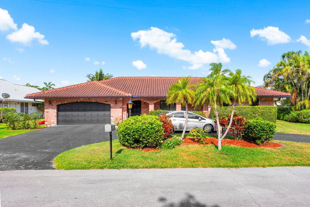 3163 Northeast 8th Avenue Boca Raton, FL 33431 - Photo 6 of 35 Exterior Front