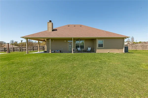 a front view of house with yard