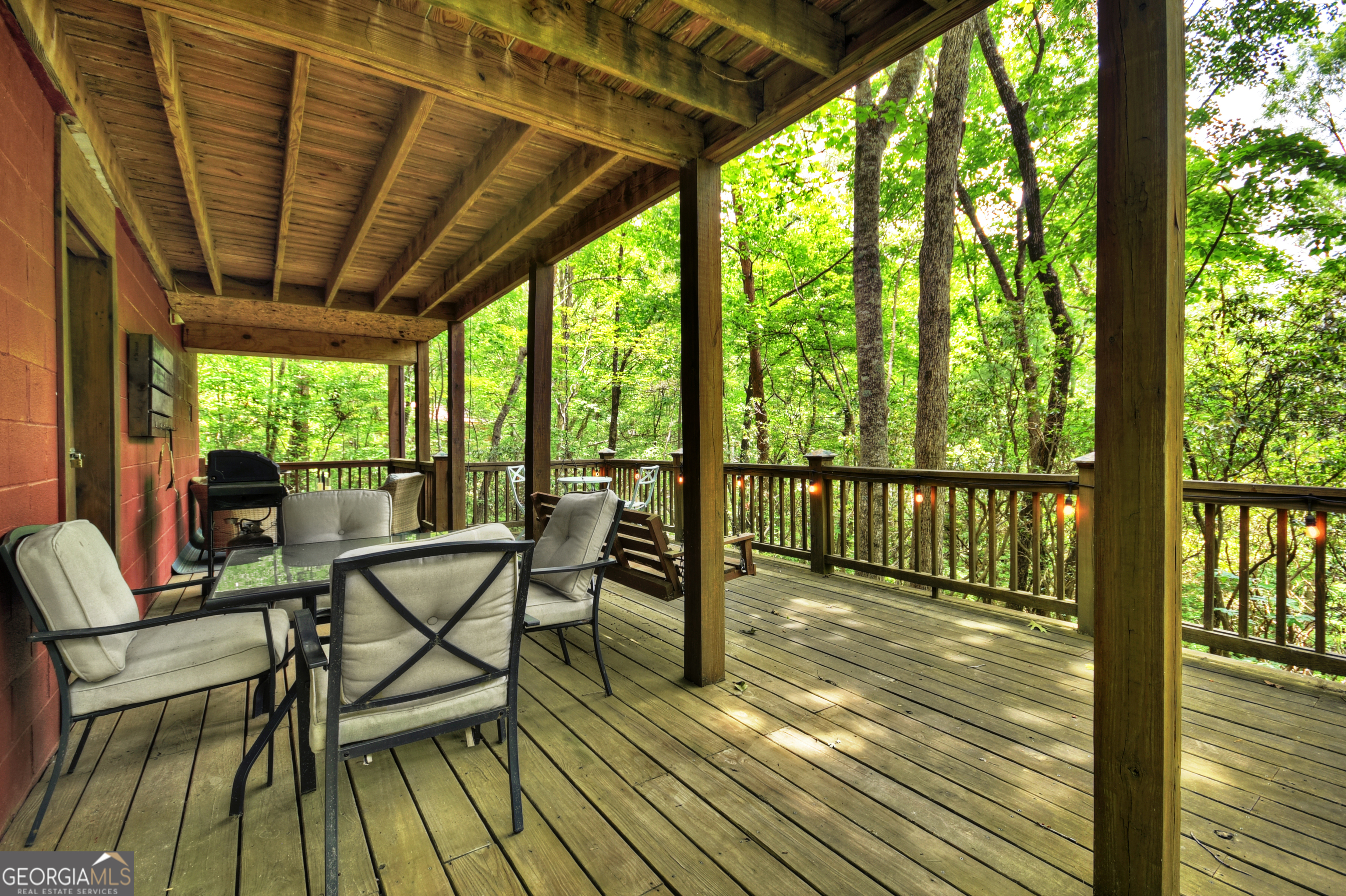 135 Tomahawk Trail Blue Ridge, GA 30513 - Photo 34 of 54 a view of a two chairs in the balcony