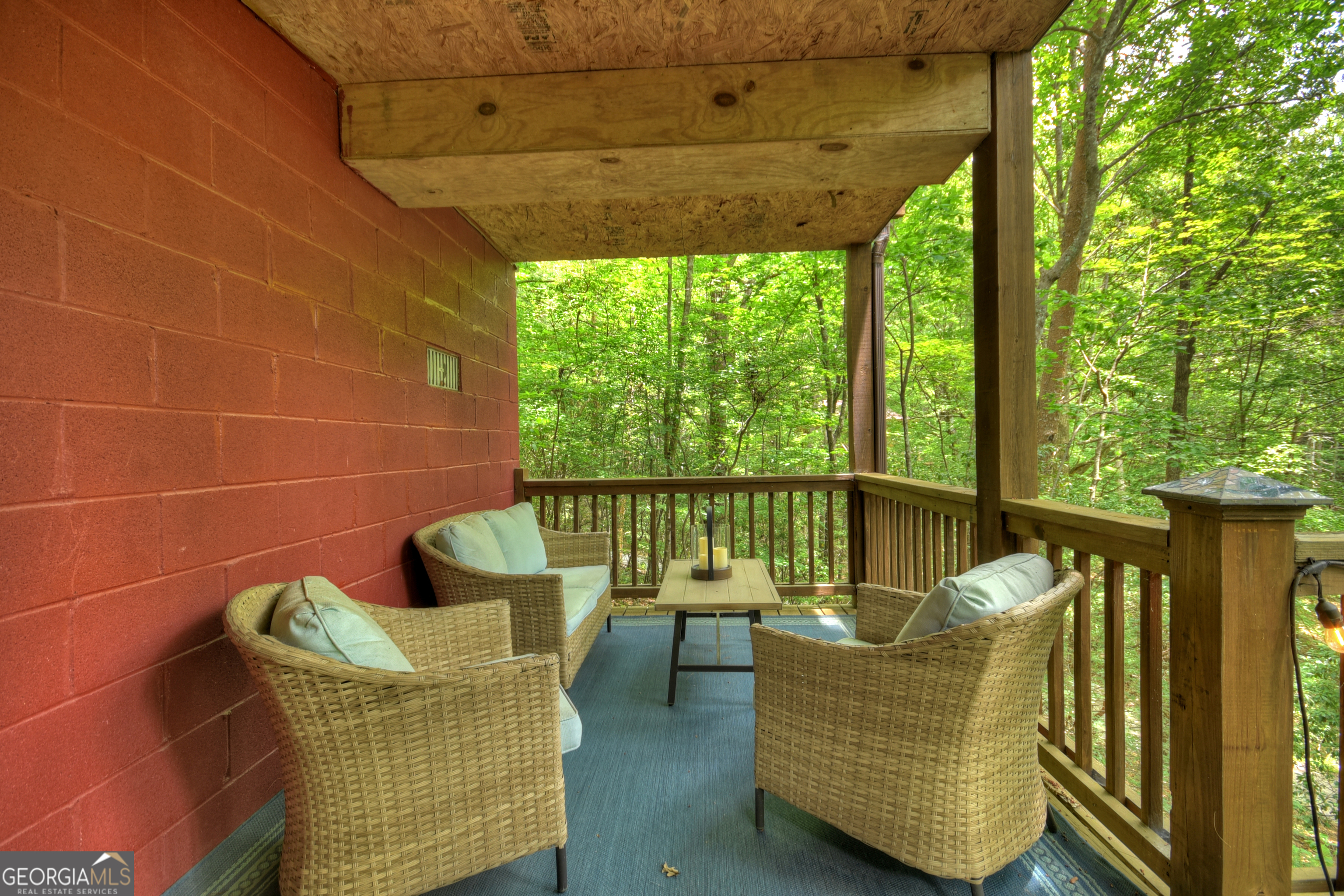 135 Tomahawk Trail Blue Ridge, GA 30513 - Photo 45 of 54 a balcony with furniture
