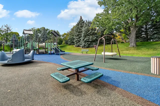 a view of a lake with a house in the background