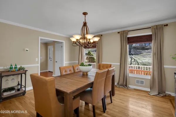 a bedroom with a bed and a television