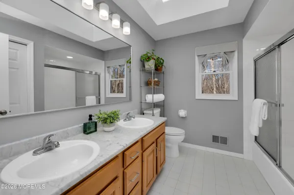 a view of a patio with wooden floor