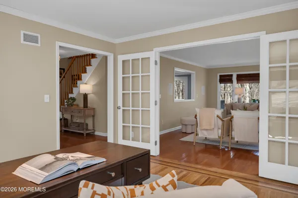 a work room with furniture and a window