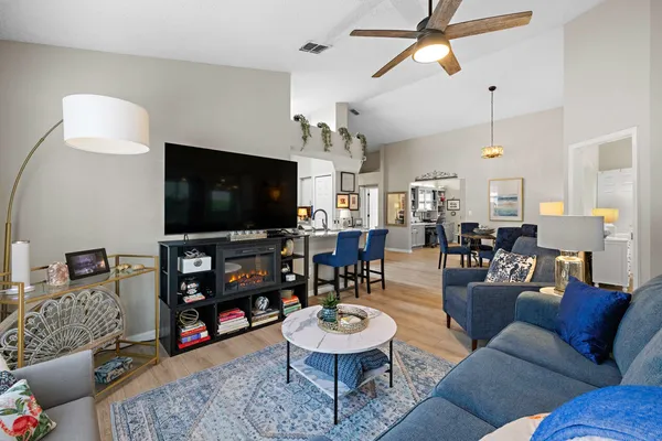 a kitchen with stainless steel appliances a refrigerator and a stove