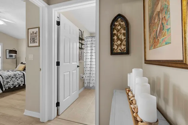 a view of a lake with houses in the back