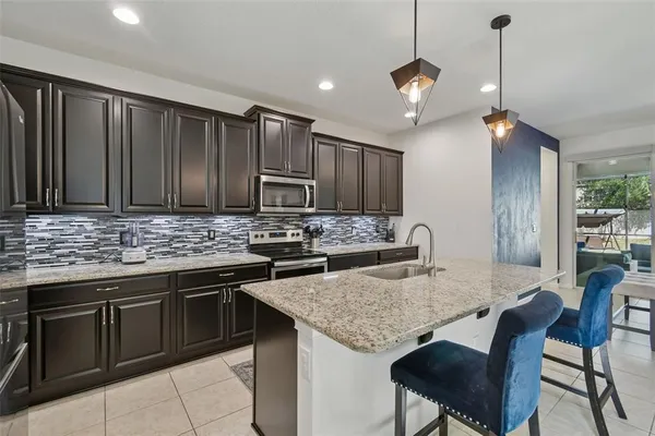 a bedroom with a bed and a desk