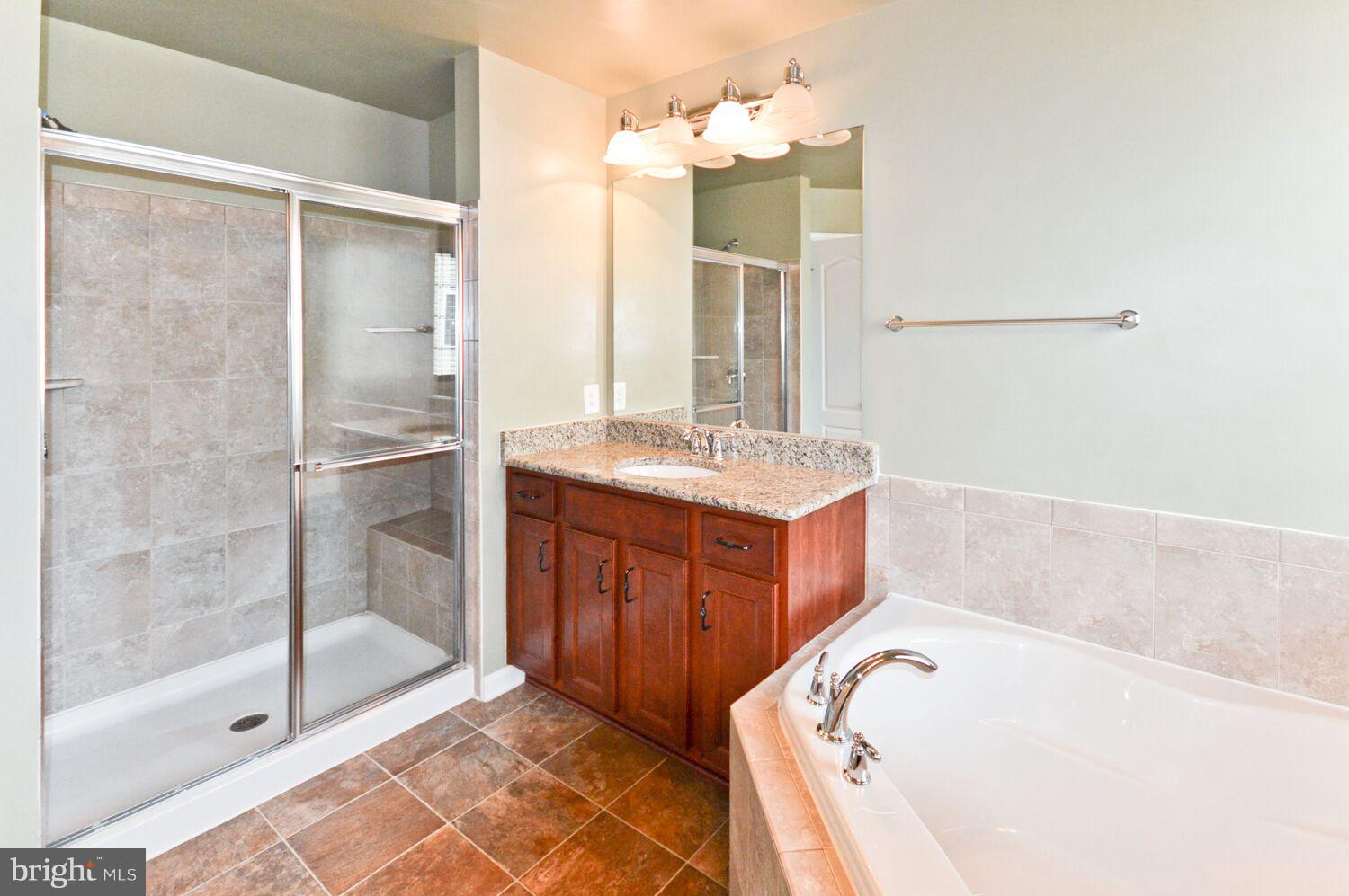 7110 Battle Field Loop Brandywine, MD 20613 - Photo 23 of 27 Master Bath