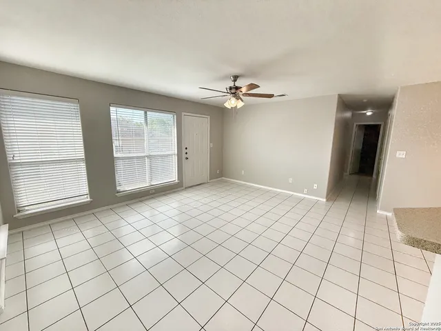 a view of an empty room and window