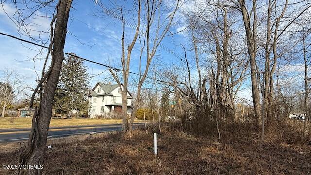 465 Lakewood Farmingdale Road Howell, NJ 07731 - Photo 17 of 19 a view of house with trees in the background