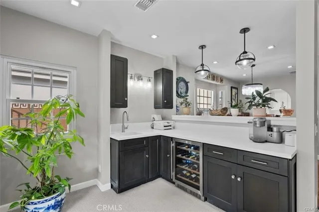 a bathroom with a sink a vanity and a mirror