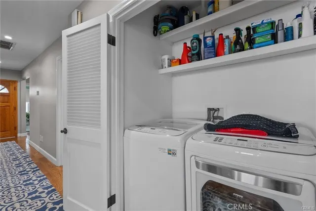 a utility room with dryer and washer