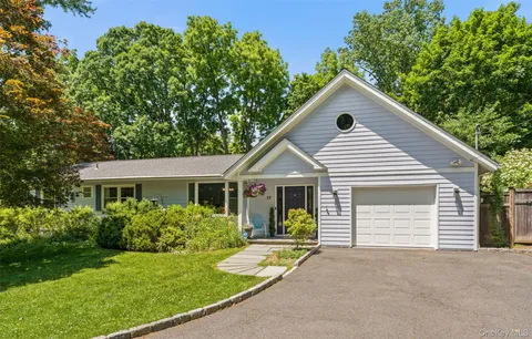 a view of a yard in front of house