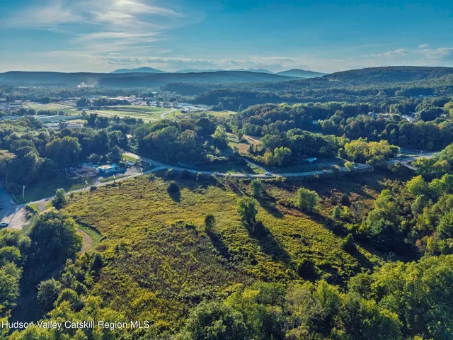 a view of lake and mountain