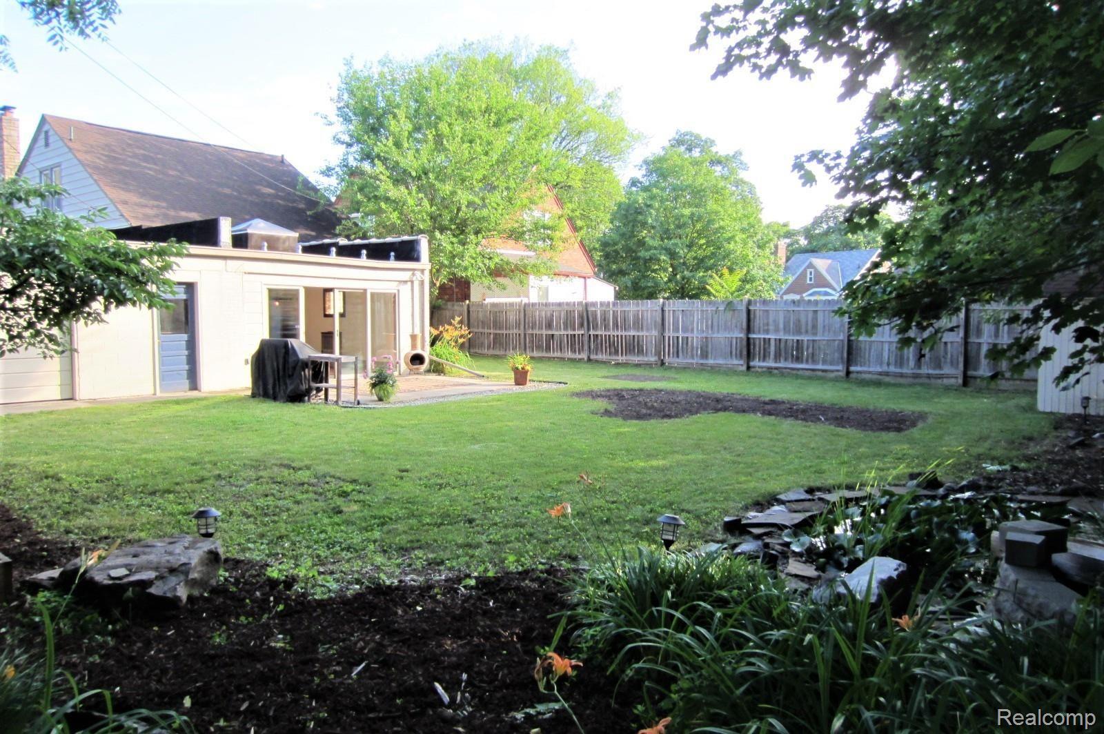 127 Ogemaw Road Pontiac, MI 48341 - Photo 26 of 30 Looking toward the house from the rear yard, by the koi pond.