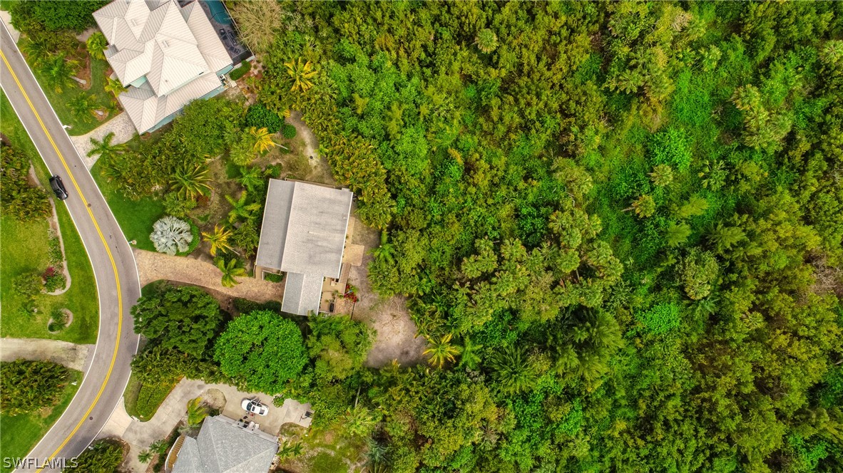 1186 Sand Castle Road Sanibel, FL 33957 - Photo 23 of 24 an aerial view of a house with a yard