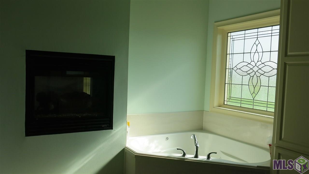 22085 Plank Road Zachary, LA 70791 - Photo 5 of 20 Master Bath Two Sided FP