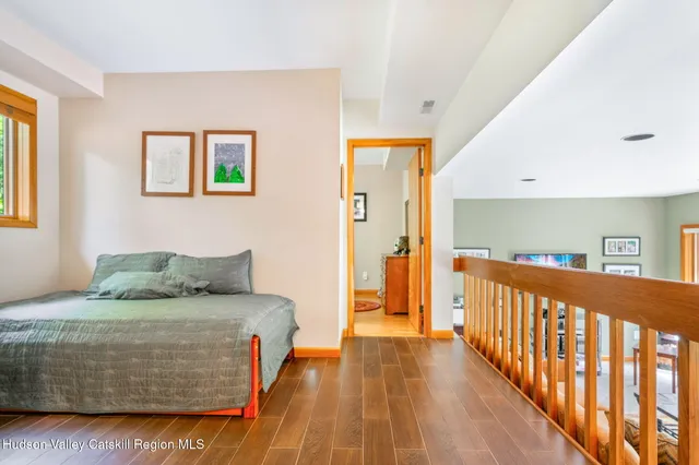 a view of a backyard with table and chairs and potted plants