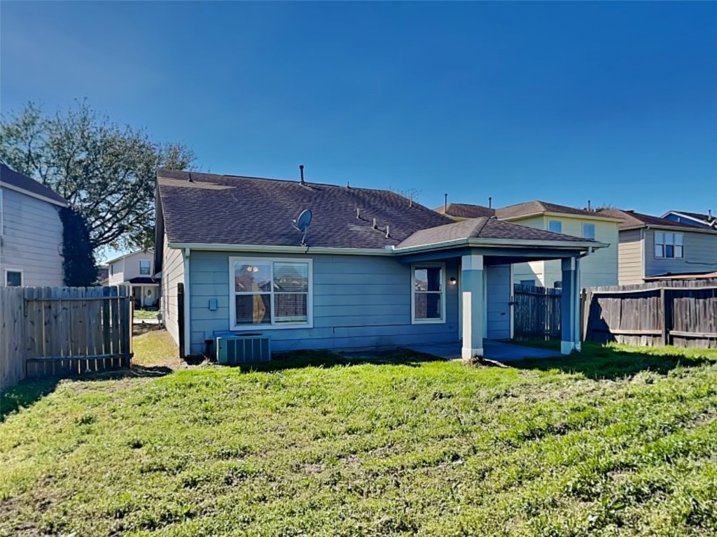 3555 Red Meadows Drive Spring, TX 77386 - Photo 15 of 15 a view of a house with a yard plants and large tree