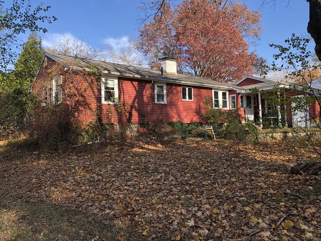 4 Hilda Road Bedford, MA 01730 - Photo 3 of 4 a front view of house with a garden