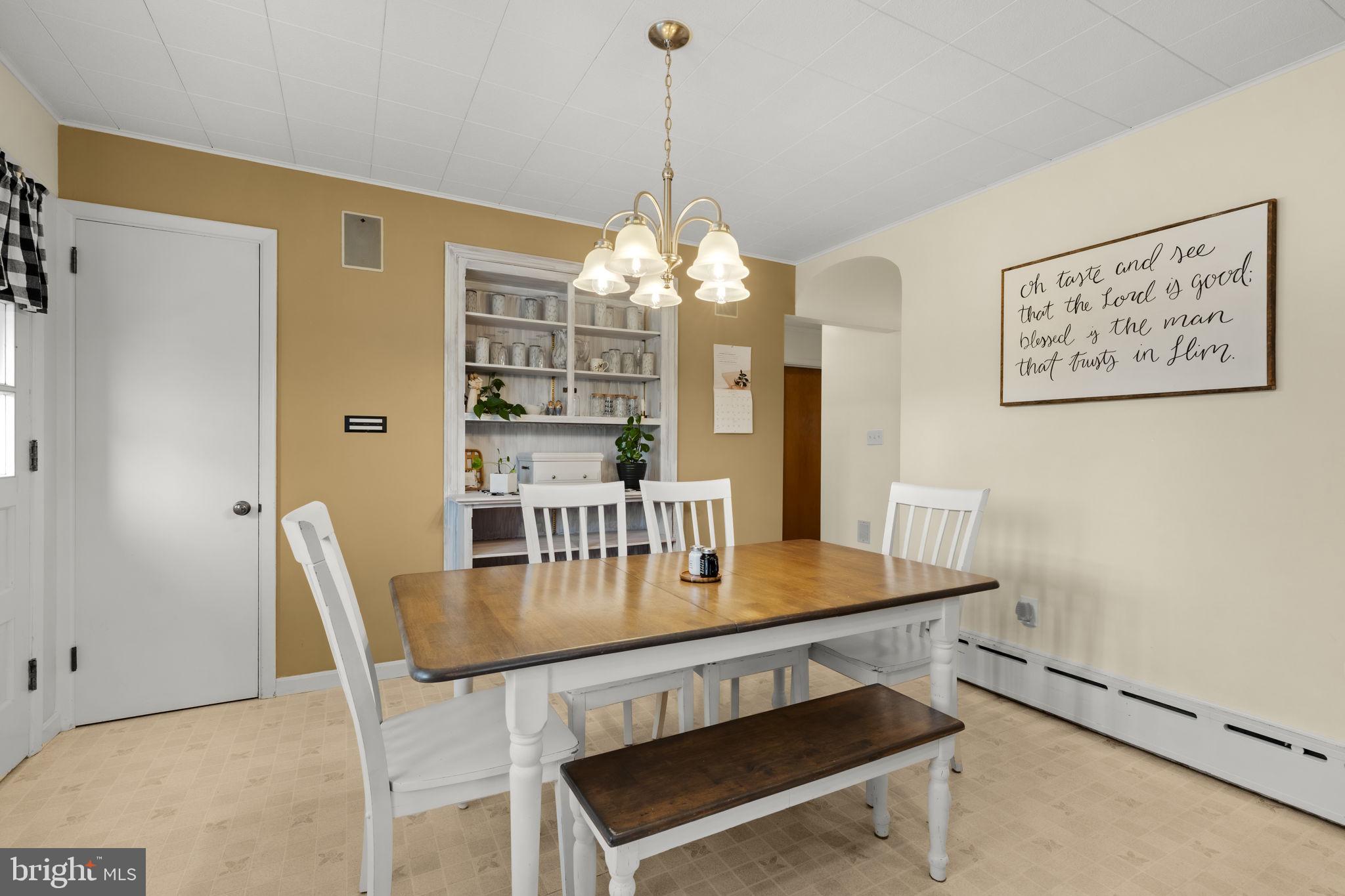 218 Lauschtown Road Denver, PA 17517 - Photo 32 of 78 a dining room with furniture and window