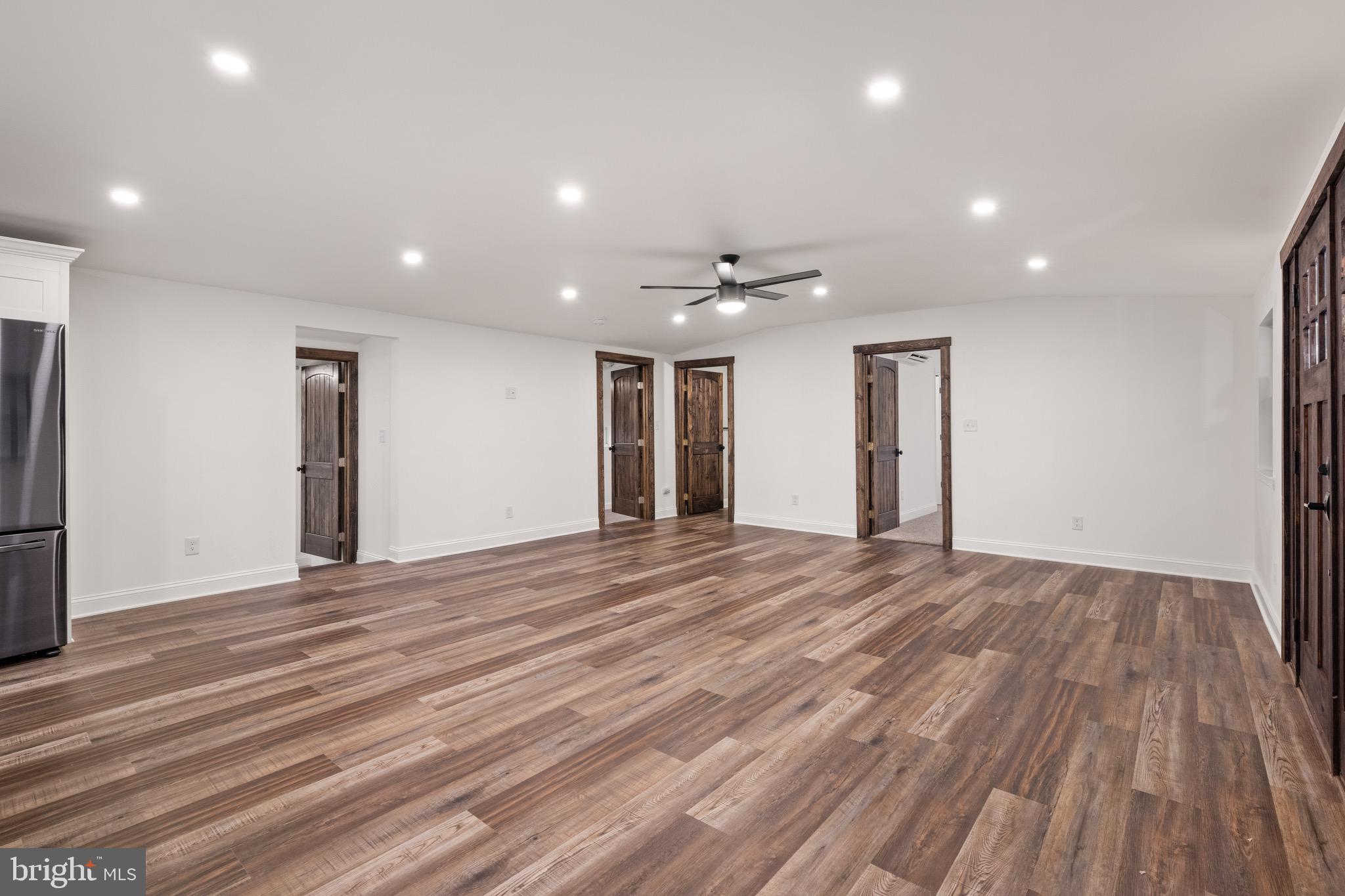 2 Schrier Avenue Salem, NJ 08079 - Photo 13 of 41 a view of an empty room with wooden floor and a window