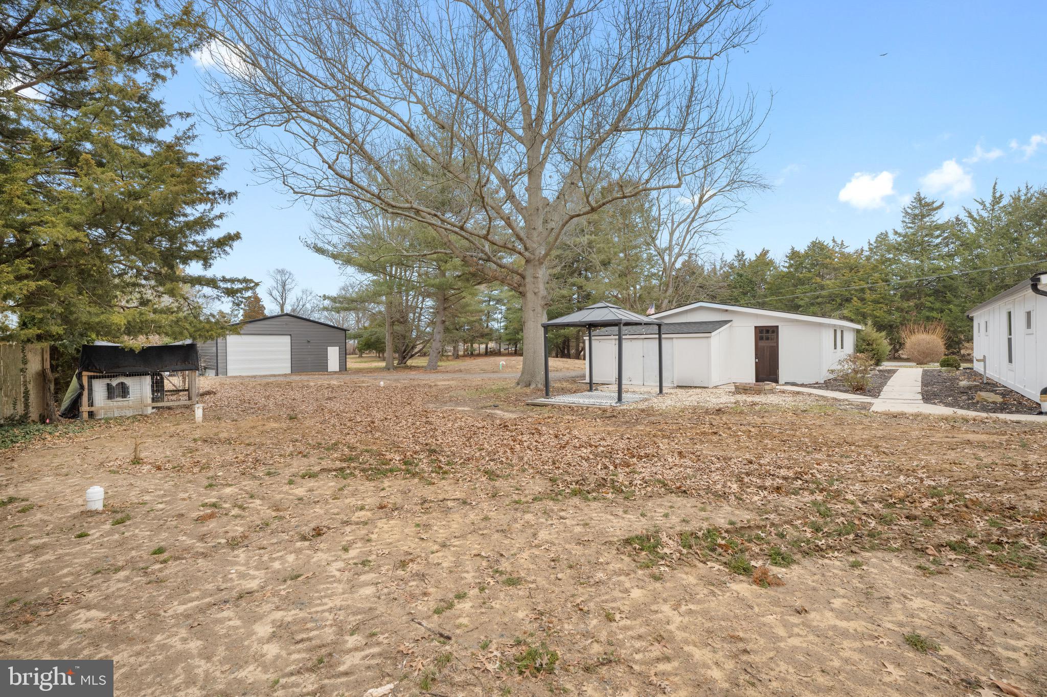 2 Schrier Avenue Salem, NJ 08079 - Photo 33 of 41 a house with trees in front of it