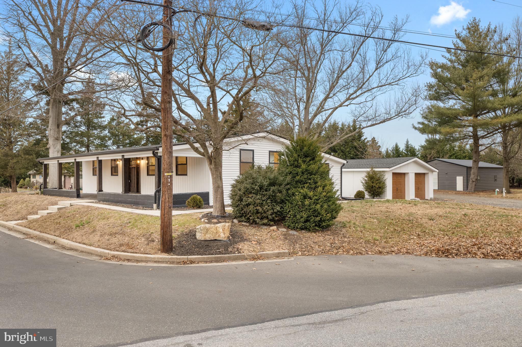 2 Schrier Avenue Salem, NJ 08079 - Photo 41 of 41 a front view of a house with yard and trees