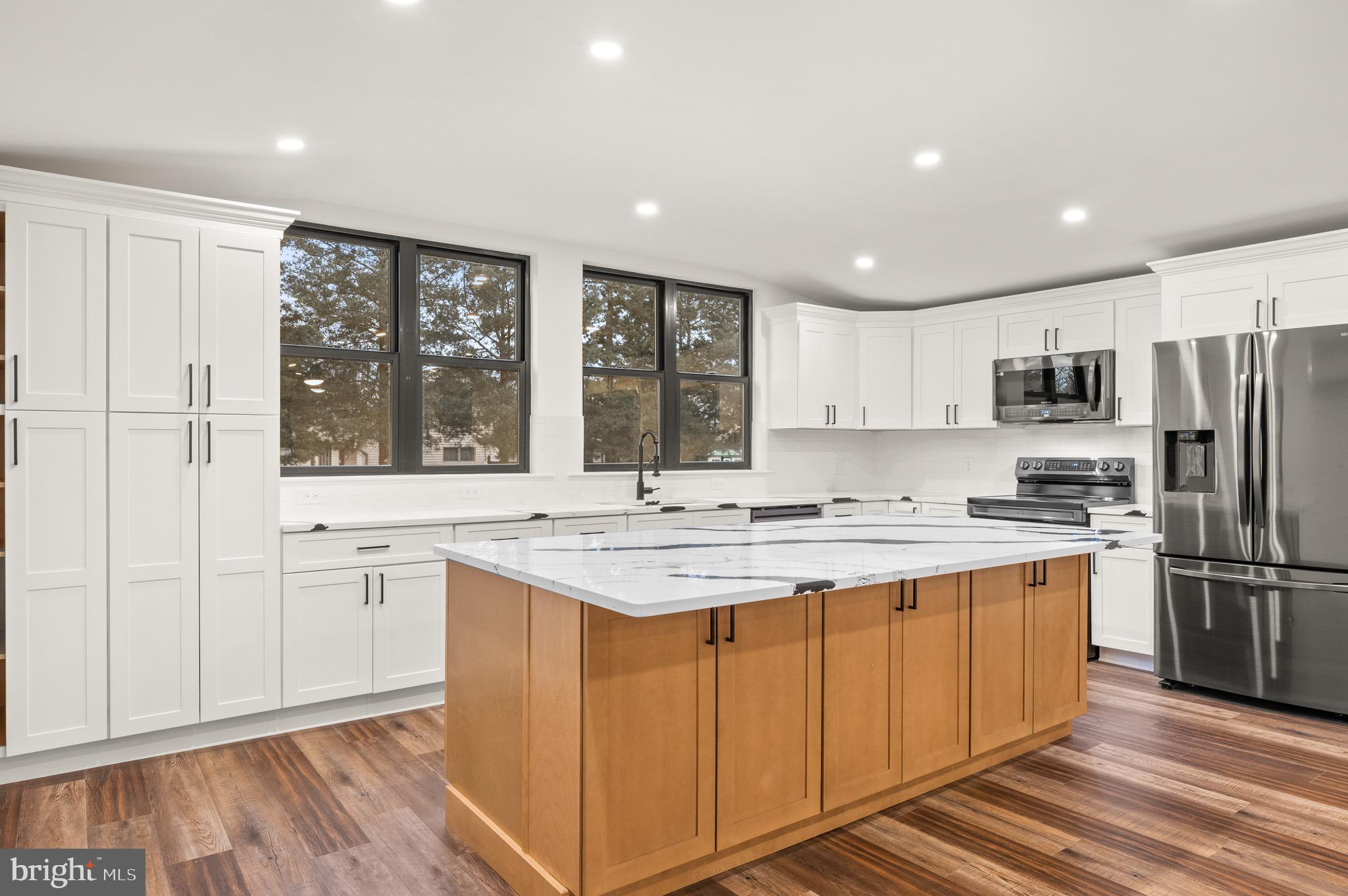 2 Schrier Avenue Salem, NJ 08079 - Photo 6 of 41 a kitchen with a stove a sink and a refrigerator