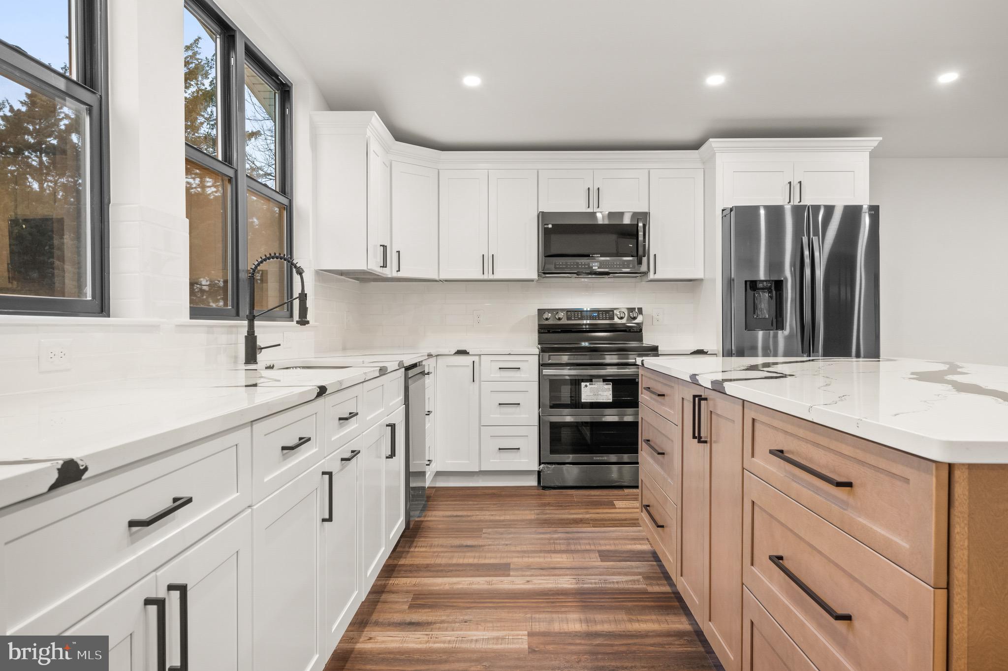 2 Schrier Avenue Salem, NJ 08079 - Photo 7 of 41 a kitchen with stainless steel appliances a sink stove refrigerator and cabinets
