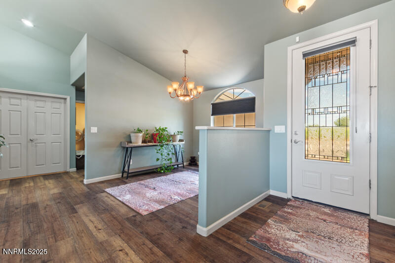 4609 Rancheria Road Fallon, NV 89406 - Photo 5 of 25 a view of a room with wooden floor and kitchen space
