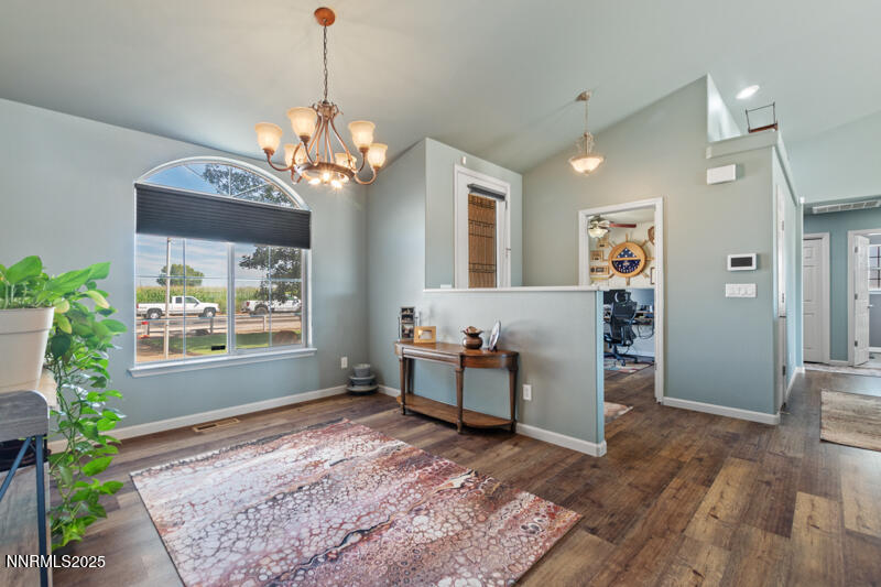 4609 Rancheria Road Fallon, NV 89406 - Photo 6 of 25 a living room with furniture and a chandelier