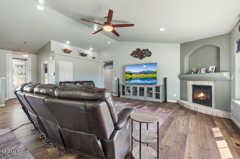 4609 Rancheria Road Fallon, NV 89406 - Photo 8 of 25 a living room with furniture and a fireplace