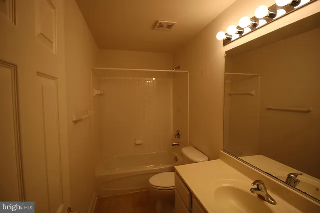 an empty room with an entryway