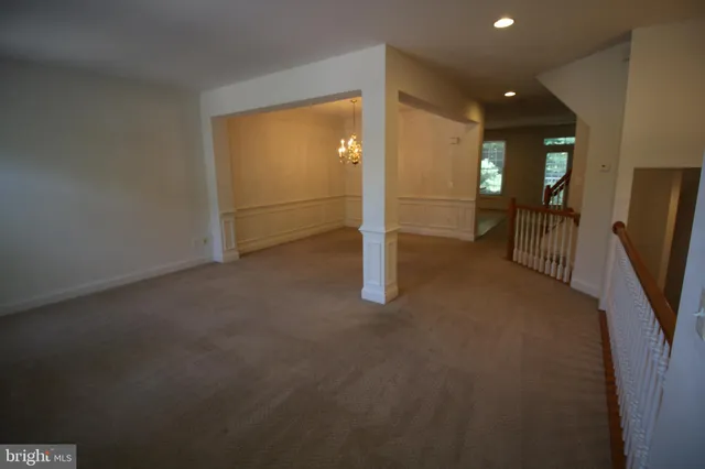 a kitchen with a stove a sink and a refrigerator