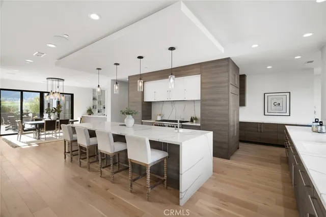 a bedroom with a large bed and a large window